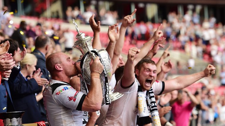 Hull FC skipper Gareth Ellis lifts the 2016 Challenge Cup trophy