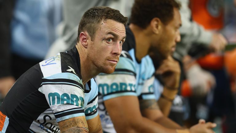 James Maloney of the Sharks watches on from the bench