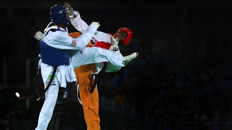 Cheick Sallah Cisse (R) landed a last-second kick to claim gold