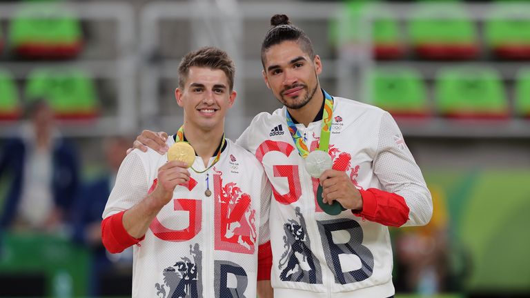 Max Whitlock and Louis Smith show off their respective Olympic gold and silver medals after the men's pommel horse final