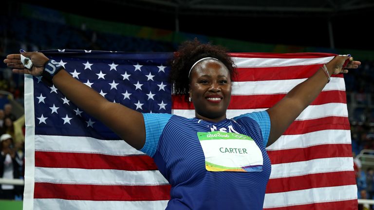 Michelle Carter celebrates after snatching gold in the shot put