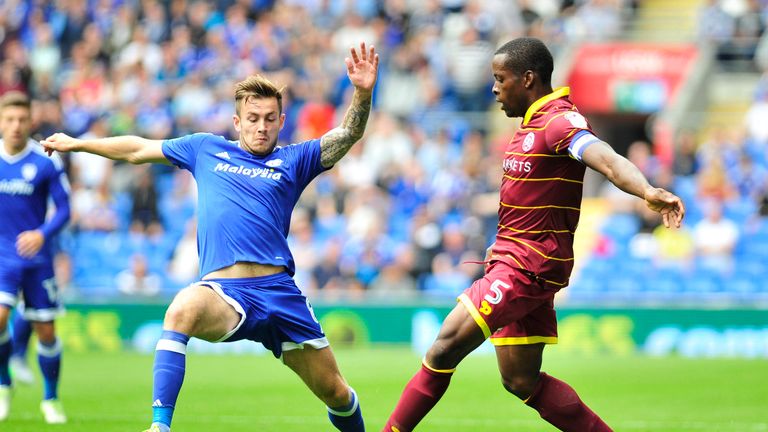 Nedum Onuoha is put under pressure by Joe Ralls