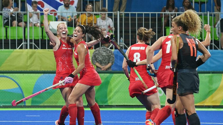 Nicola White (left) celebrates scoring for Great Britain during regulation play
