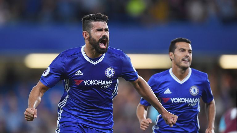 Diego Costa celebrates scoring the winning goal