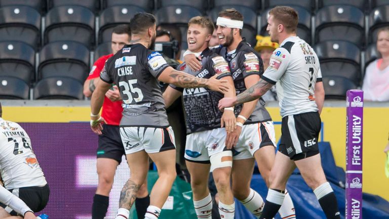 Ryan Hampshire celebrates scoring one of his two tries against league leaders Hull FC