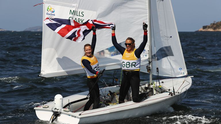 Hannah Mills (left) and Saskia Clark celebrate winning gold in the women's 470 class