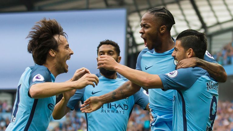 Raheem Sterling celebrates scoring Manchester City's first goal against West Ham