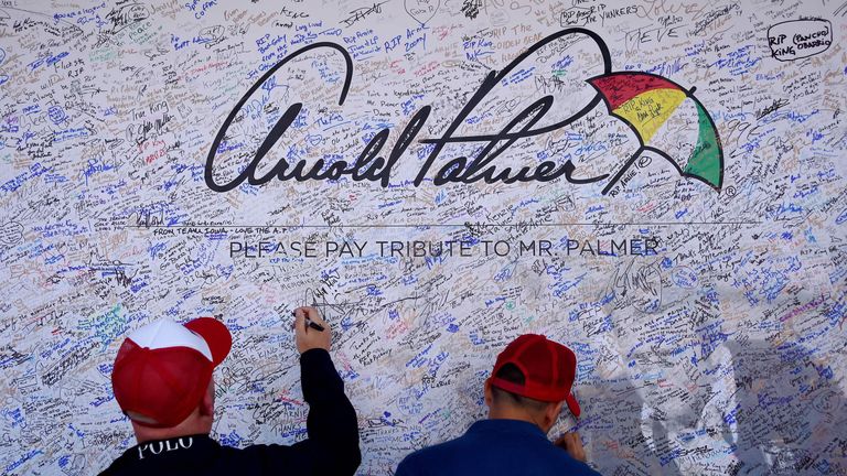 Fans sign a tribute wall for Arnold Palmer at Hazeltine National ahead of the Ryder Cup