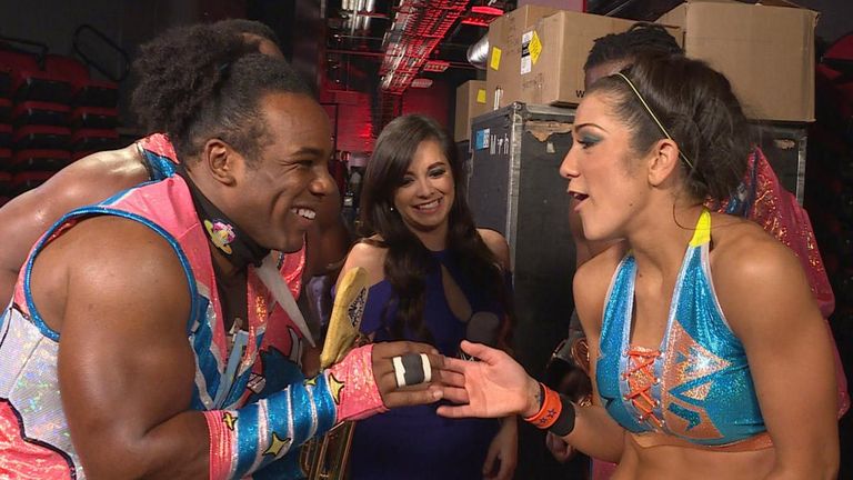 Xavier Woods and Bayley celebrate last week's win