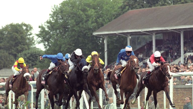 Frankie Dettori riding Diffident to victory in the Racal Diadem Stakes at Ascot