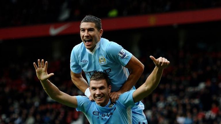 edin-dzeko-alekasandar-kolorov-manchester-city-old-trafford_3781488.jpg