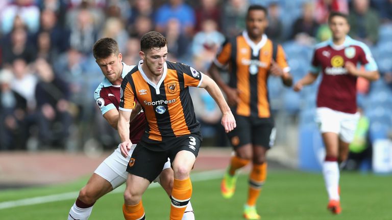 Johann Berg Gudmundsson of Burnley puts pressure on Andy Robertson