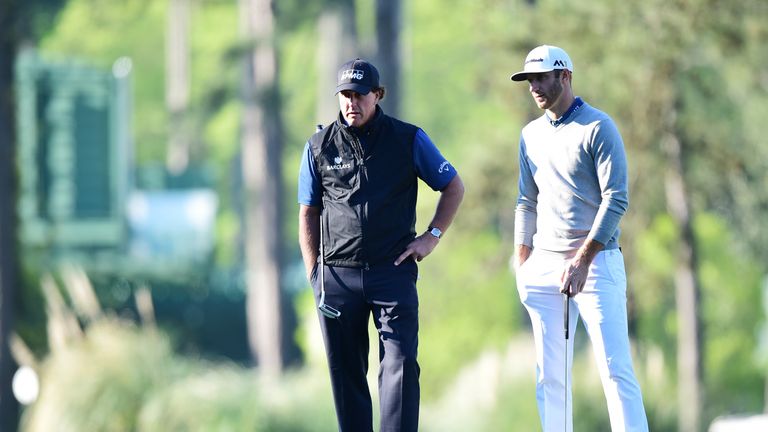 Mickelson (left) and Johnson enjoy a practice round together at Augusta National earlier this year
