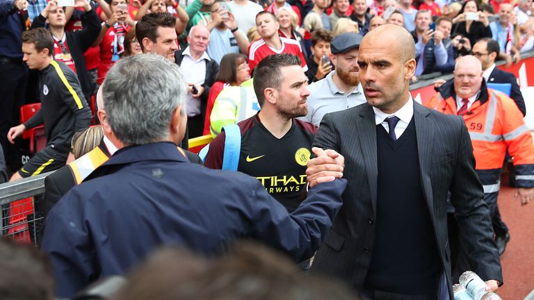 Mourinho shakes hands with Pep Guardiola prior to kick-off