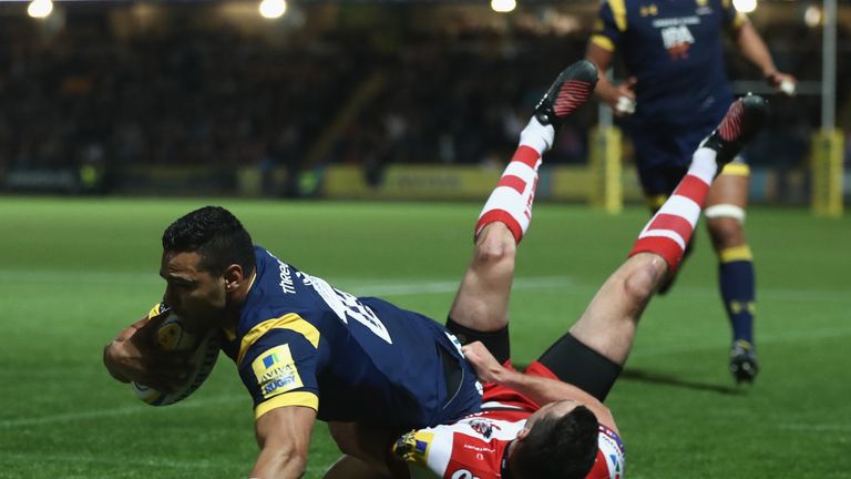 Ben Te'o of Worcester dives over for the first try 