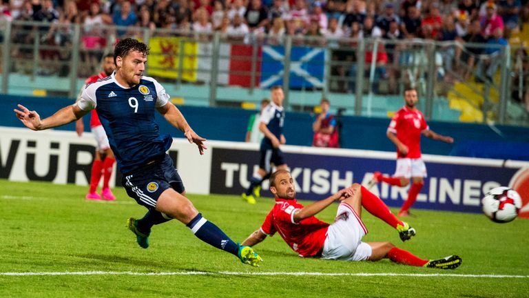 Scotland's Chris Martin (left) scores his side's second goal