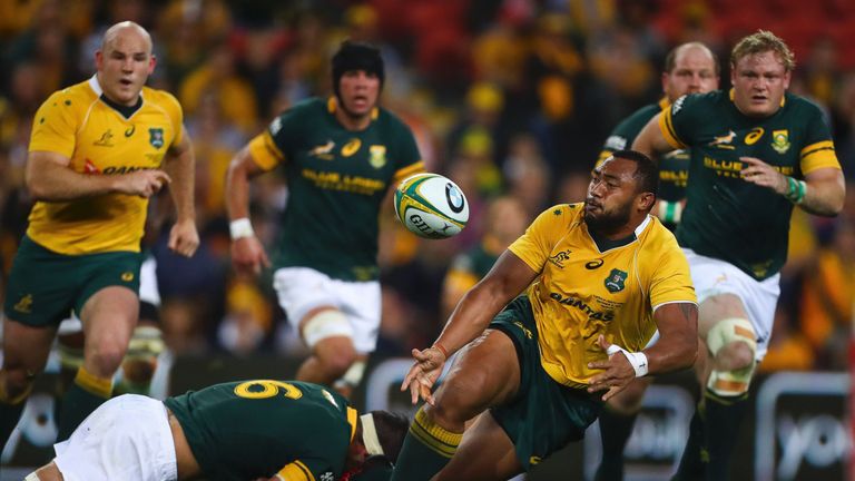 Sekope Kepu offloads as he is tackled by Francois Louw 