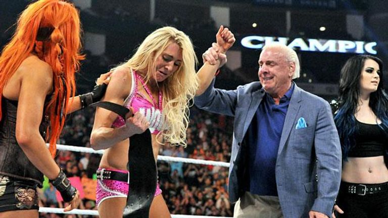 A teary Charlotte celebrates winning the Divas Title