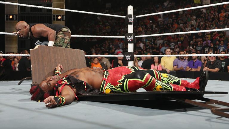 Xavier Woods was put through a table by The Dudley Boyz