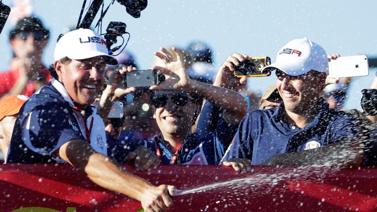 Phil Mickelson and Jordan Spieth celebrate their Ryder Cup triumph last year