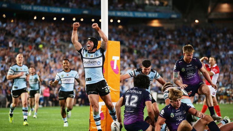 Michael Ennis celebrates Andrew Fifita's try