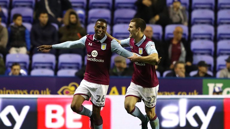 Jonathan Kodjia of Aston Villa is congratulated by team mate Gary Gardener