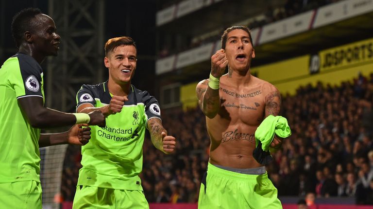 Roberto Firmino celebrates with Liverpool team-mates Sadio Mane and Philippe Coutinho