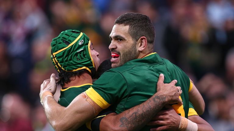 Greg Inglis (right) scored a try in each half against the Kiwis