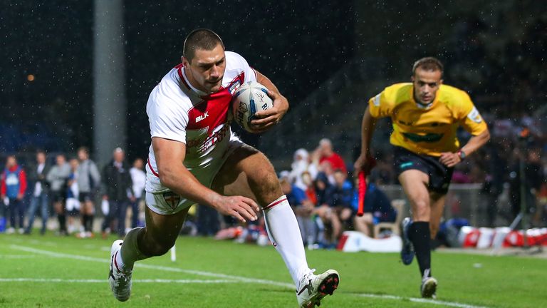 Ryan Hall goes over for one of his tries, his tally for England now 28 in 28 games