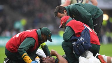 Eben Etzebeth receives treatment after being hurt at Twickenham