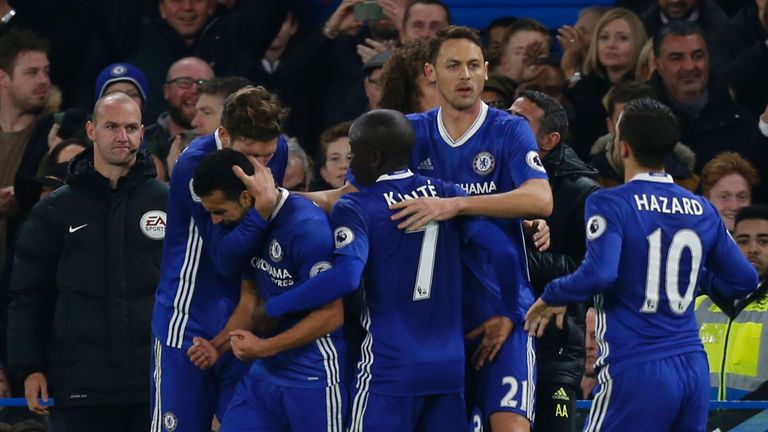 Chelsea midfielder Pedro (centre) is congratulated after equalising for Chelsea