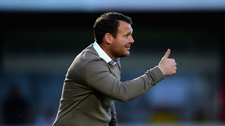 Stevenage's Darren Sarll is hoping for a a slip up from Carlisle or Blackpool.