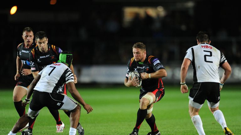 Lewis Evans carries for the Dragons