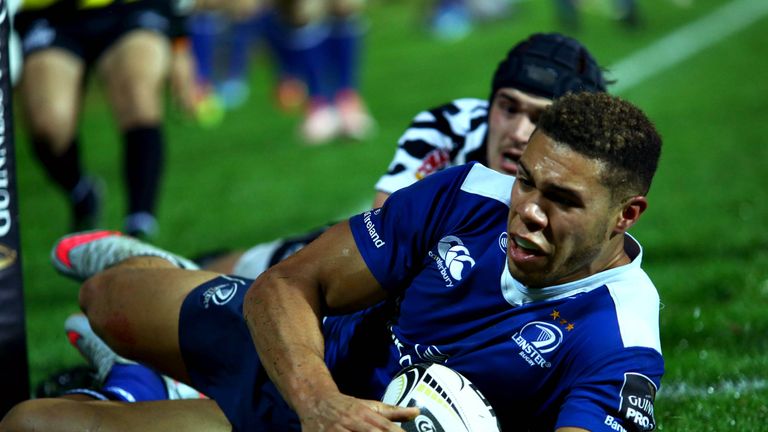 Adam Byrne scores one of his three tries against Zebre