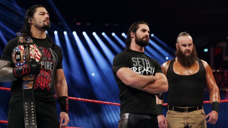 Seth Rollins (centre) has joined Raw's Survivor Series team