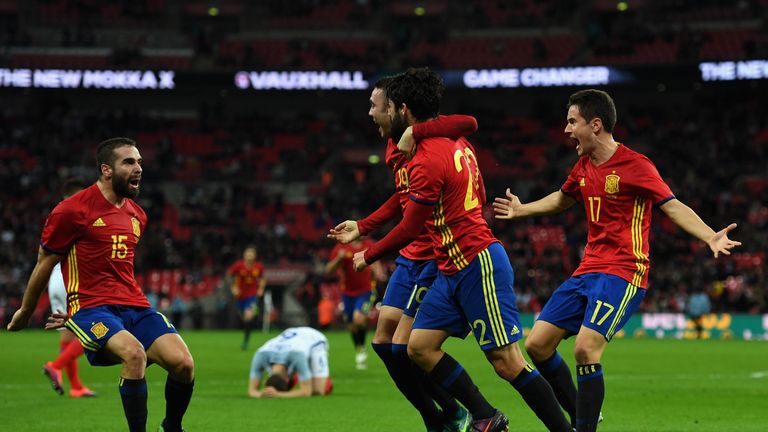 Spain celebrate Isco's late equaliser at Wembley on Tuesday evening