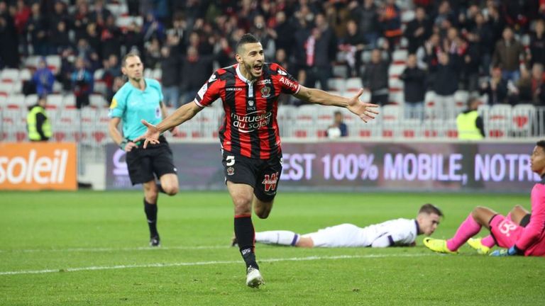 Younes Belhanda wheels away in celebration after doubling Nice's lead against Toulouse