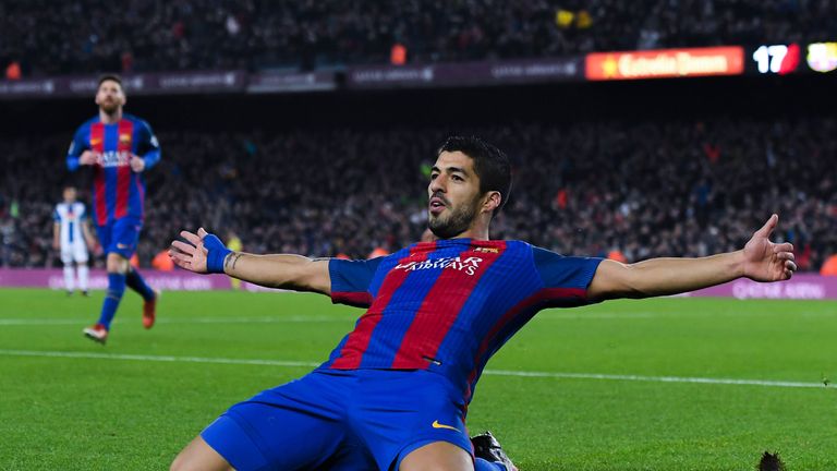 Luis Suarez celebrates another Barcelona goal