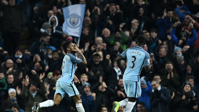 Raheem Sterling celebrates scoring City's winning goal