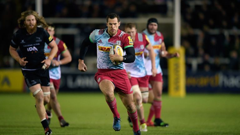 Tim Visser races clear to score a vital try for Harlequins
