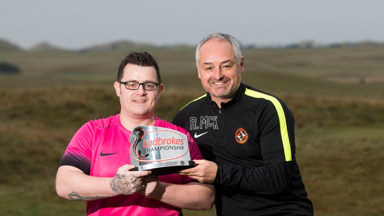 Dundee Utd fan Tommy McKay receives goal of the month award for Terrors boss Ray McKinnon