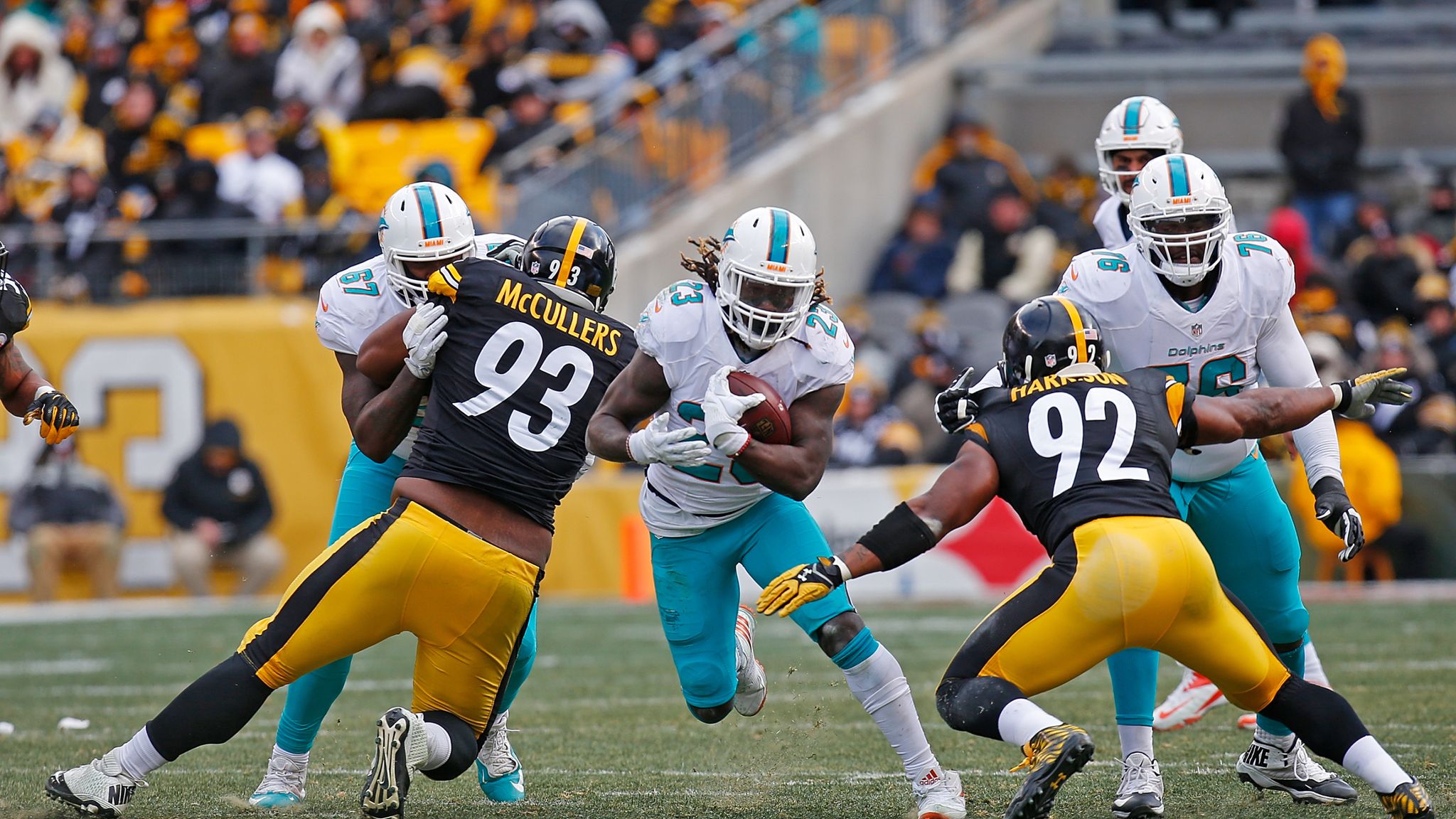 Miami Dolphins defensive end Damontre Moore (57) celebrates after breaking  up a pass during the second half of an NFL football game against the New  England Patriots, Sunday, Jan. 3, 2016, in