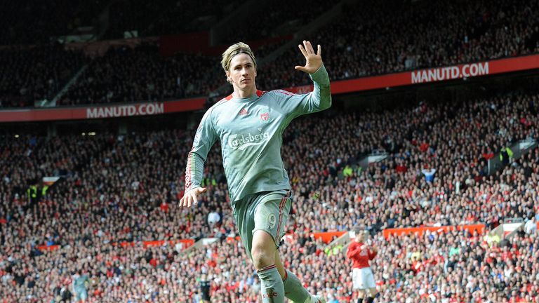 Torres celebrates scoring in a 4-1 Liverpool win at Man Utd in 2009