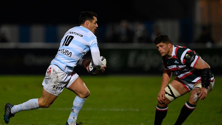 Dan Carter runs at Leicester forward Mike Williams