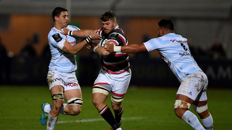 Ed Slater is tackled by Racing 92 duo So'otala Fa'aso'o (R) and Gerbrandt Grobler