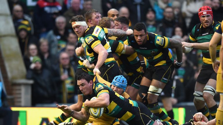 Louis Picamoles dives over the line to score Northampton's first try