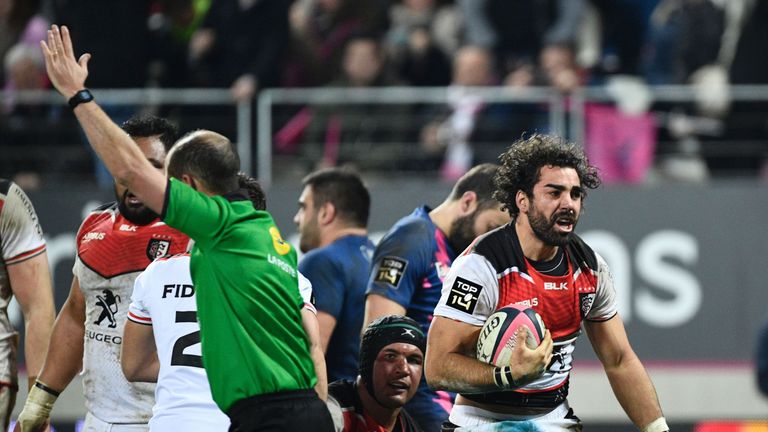 Yoann Huget (right) celebrates after scoring one of his two late tries against Stade Francais