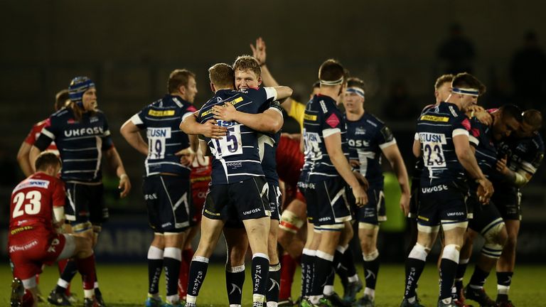 Sale celebrate after the final whistle at the AJ Bell