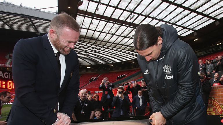 Zlatan Ibrahimovic and Wayne Rooney teamed up to cut a giant cheese on the Old Trafford pitch