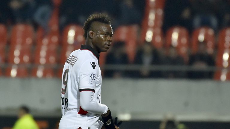 Nice's Mario Balotelli leaves the field after receiving a red card against Lorient